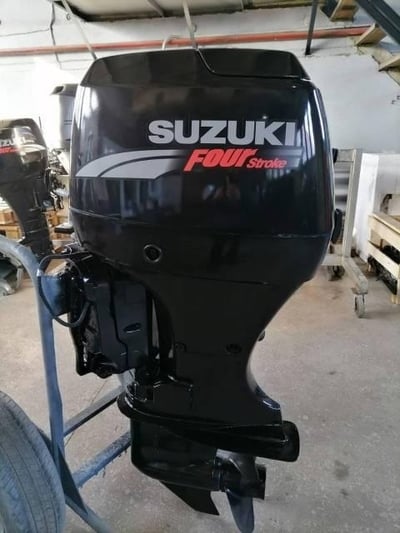 купить 4х-тактный лодочный мотор SUZUKI DF70ATL Б/У в Челябинске - фото 